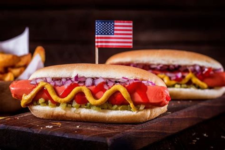 Fans all say the same thing as Paige Spiranac gives bizarre hotdog eating tutorial while wearing American flag bikini