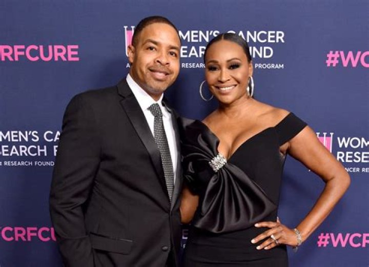 RHOA's Cynthia Bailey and husband Mike Hill show off their wedding rings in first photos after extravagant ceremony