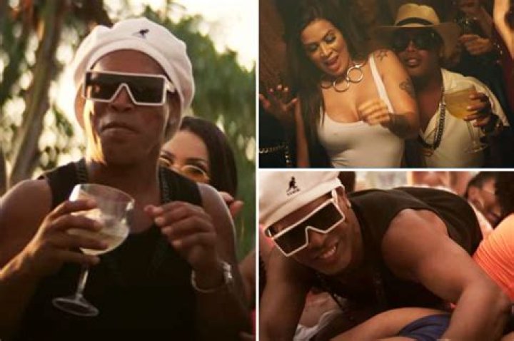Ronaldinho raps while surrounded by half-naked twerking beauties as Brazil legend reveals plans for eight songs in 2021