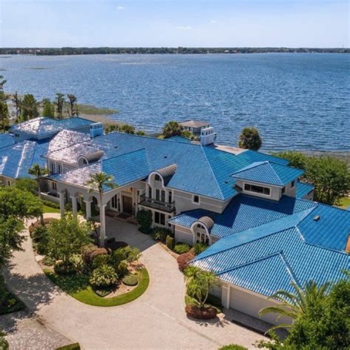 Inside Shaquille O’Neal's $19.5million lakeside Florida mansion that's up for sale with indoor court & 17-car garage