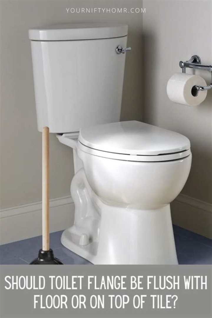 Question: Should Toilet Flange Sit On Top Of Tile