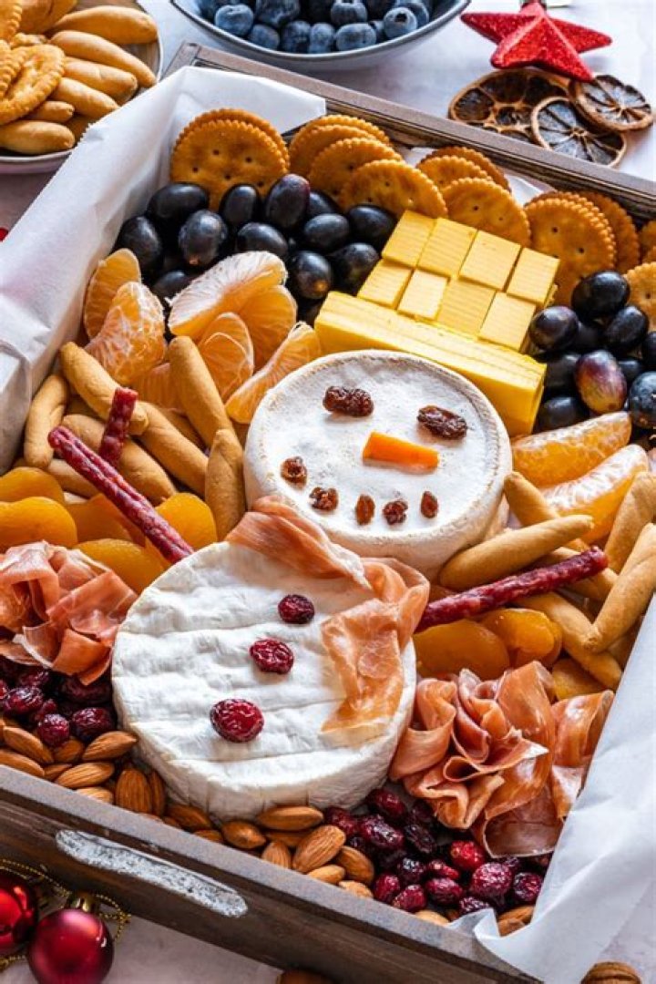 My 'Frosty the snowman' Christmas cheese and fruit platter is a winner for holiday parties, and easy to put together