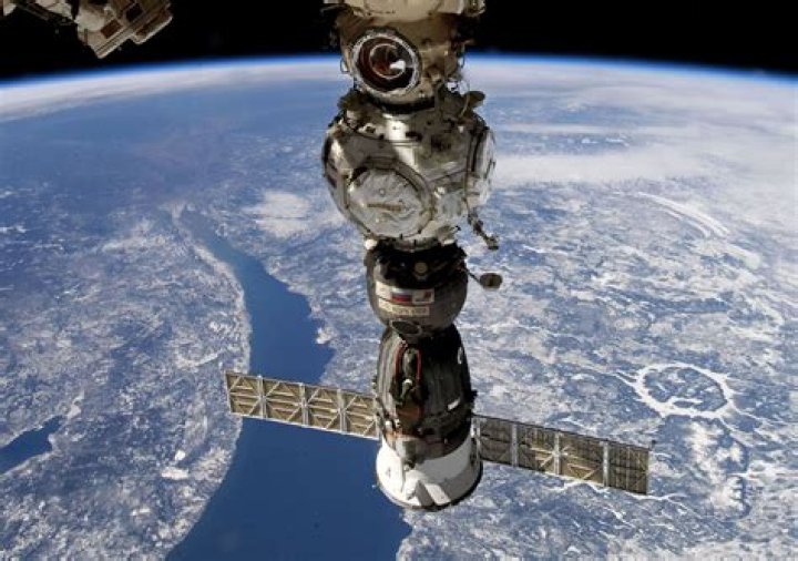 Soyuz returns astronaut and cosmonauts from space station