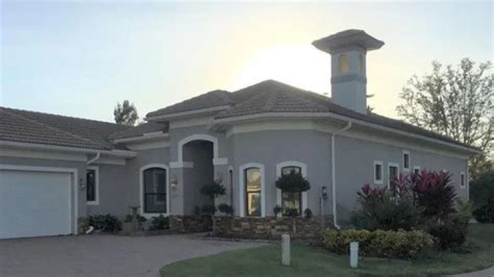I was sued by my posh neighbors over the color I painted my $500,000 house - even my friends were shocked by my art