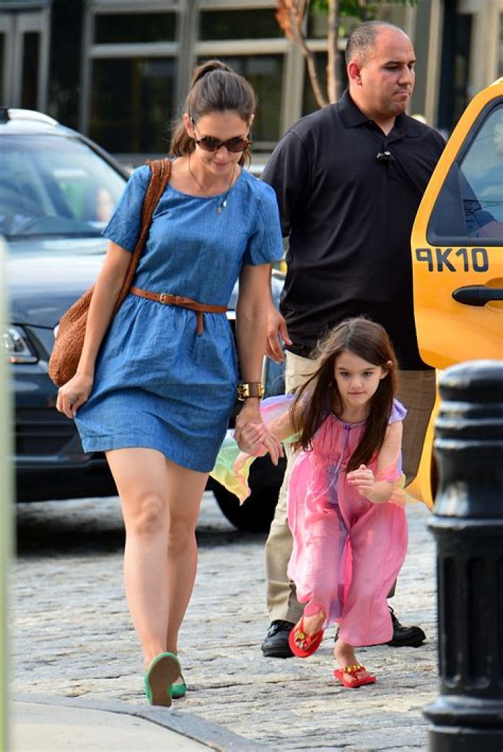 Suri Cruise, nearly 18, towers over mom Katie Holmes and shows off edgy Western-inspired style in NYC