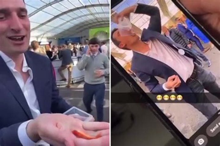 Shocking moment top racing agent swallows LIVE goldfish on dancefloor as racegoers shriek in horror