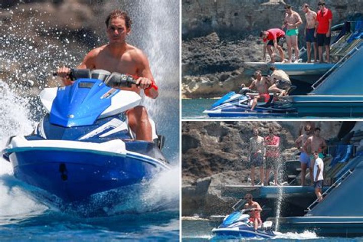 Topless Rafa Nadal takes to the waves on a jetski as tennis legend enjoys Ibiza holiday with wife Xisca Perello – The US Sun