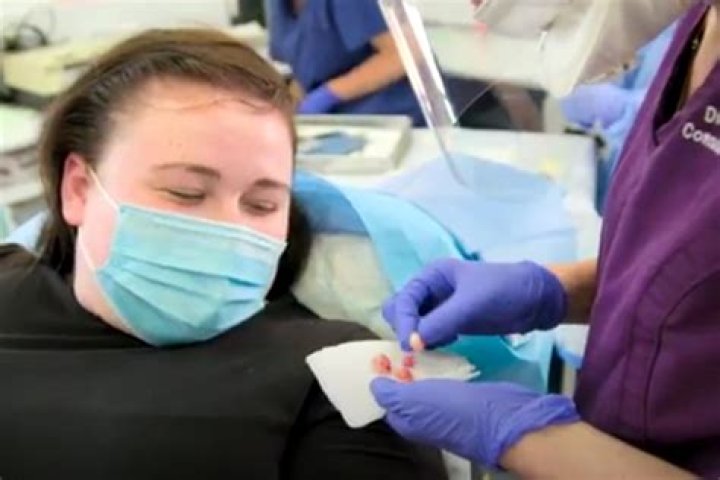 UK'S Dr Pimple Popper bursts marble-shaped cysts on woman's scalp in gross new video