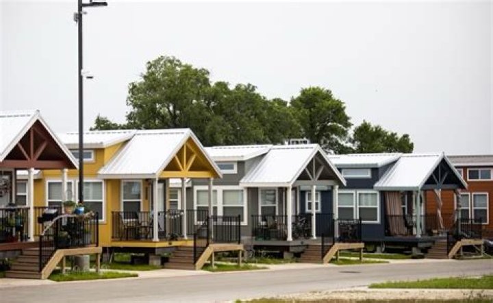 Inside first-of-its-kind tiny home village with houses for $1,430 a month - and there's an added cost
