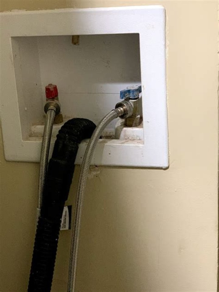 Washing Machine Drain Overflows By Wall Where Discharge Hose Goes In