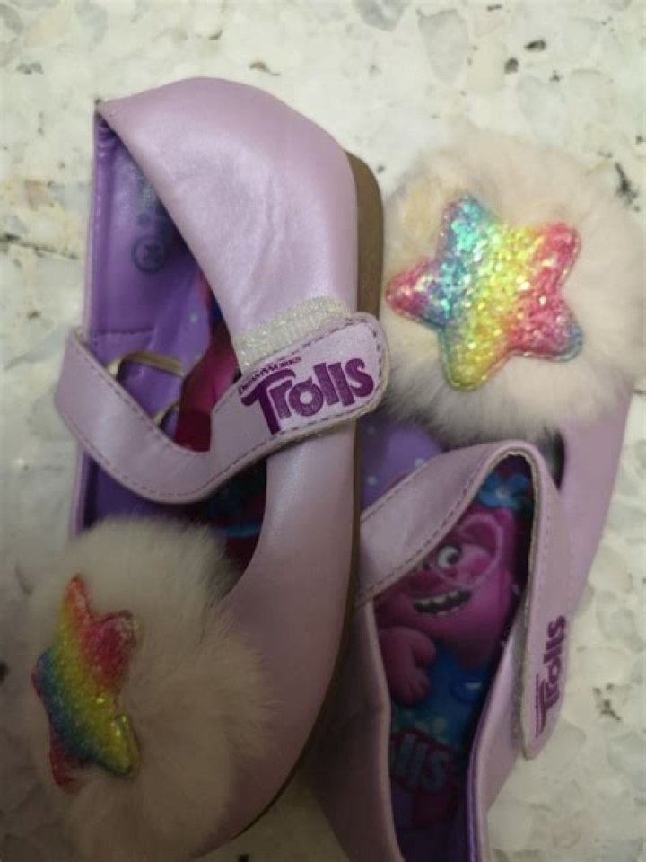 I made a fringed backdrop for my camping wedding but trolls called it ‘hideous’ - then I showed them the shoes I wore