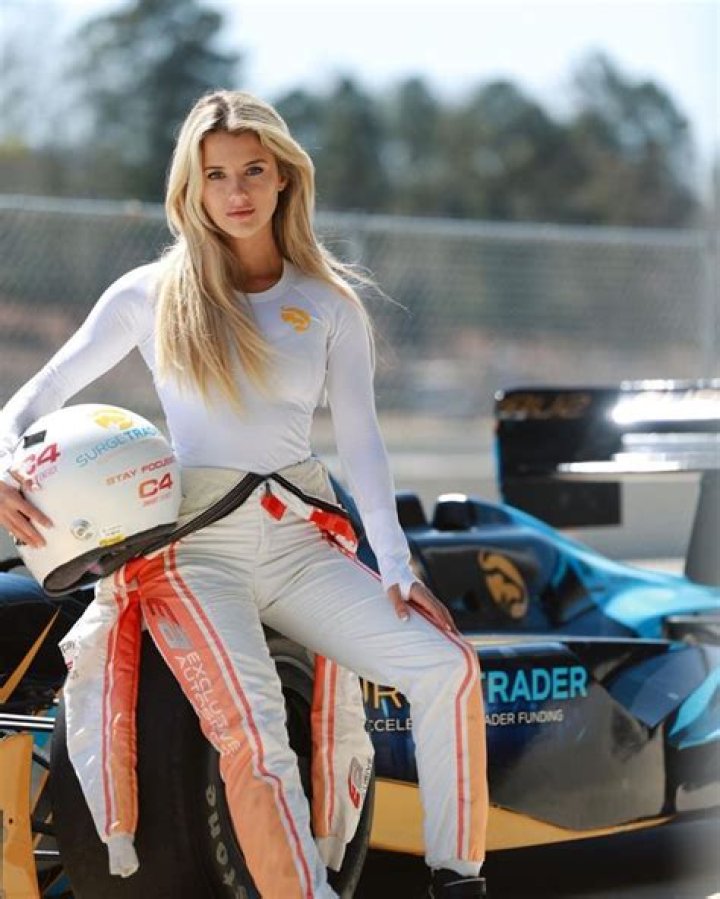 World's sexiest racing driver Lindsay Brewer sizzles in revealing top and leaves behind track in teased snaps