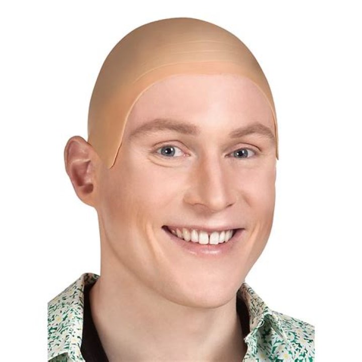 YouTube star James Charles accused of 'faking' shaved head for 'attention by wearing bald cap' in dramatic new makeover